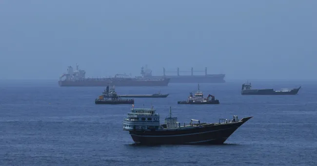 Iran strikes vessel in Strait of Hormuz amid debate over “transit fees”